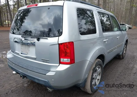 2010 Honda Pilot Touring z USA, uszkodzony, nr VIN 5FNYF4H94AB026325